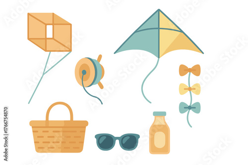 Colorful set of outdoor leisure items including kites, picnic basket, sunglasses, and drink bottle