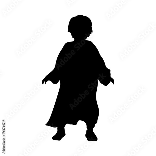 Child in Halloween ghost costume silhouette