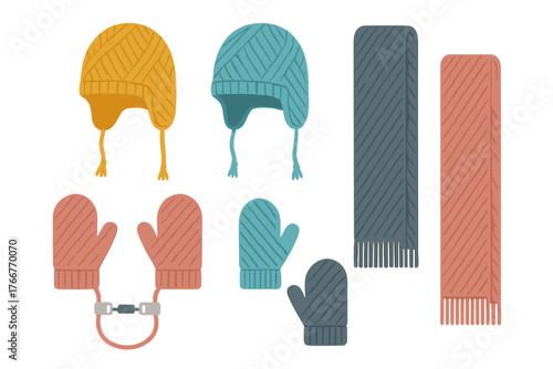 Cozy knitted winter hats mittens and scarves in warm seasonal colors