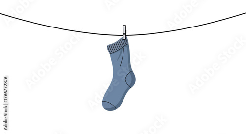 Single blue sock hanging on clothesline with clothespin
