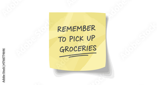 Yellow sticky note with the handwritten message remember to pick up groceries isolated on