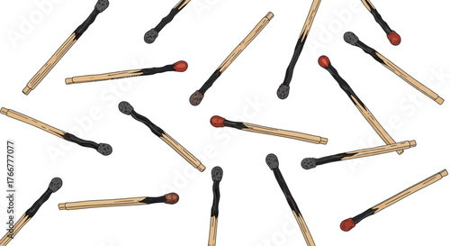 Scattered collection wooden matches with red tips and black striking heads, lying randomly on surface