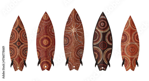 Five surfboards decorated with traditional aboriginal dot patterns, representing australian surf culture and indigenous