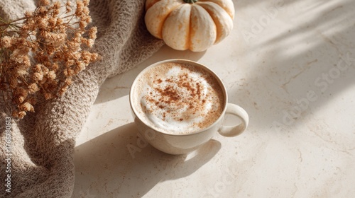 A cup of pumpkin latte on a light milky countertop. A cozy atmosphere. High detail. View from above. Fashion photo shoot. Soft sunlight

