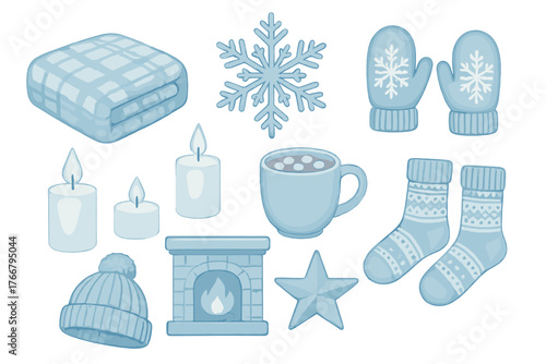 Cozy winter comfort collection of warm essentials including blanket, hot cocoa, candles, and mittens