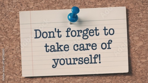 Reminder to take care of yourself pinned to a corkboard