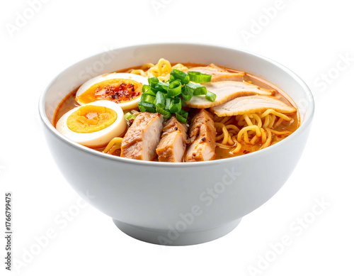 A bowl of savory ramen with broth, noodles, sliced pork, egg halves, and chopped green onions sits isolated
