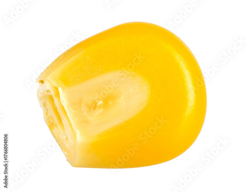 A close-up shot of a single corn kernel, showcasing its golden yellow color and textured surface against black