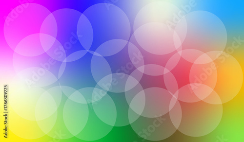 Vibrant rainbow bokeh background with soft glowing circles and gradients