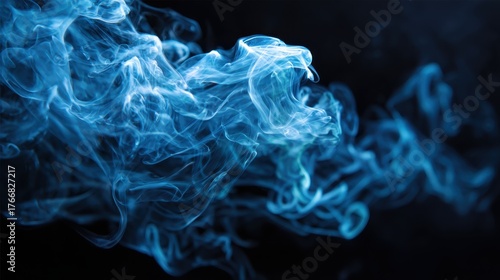 Swirling blue smoke against a dark background creates a mesmerizing visual effect