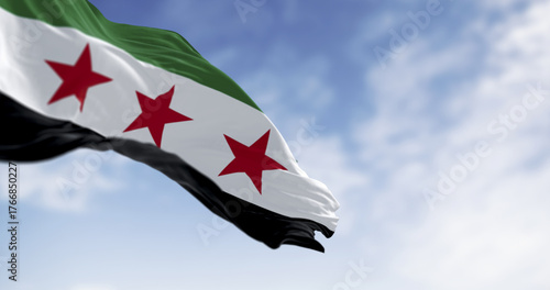 Syria national flag waving on a clear day