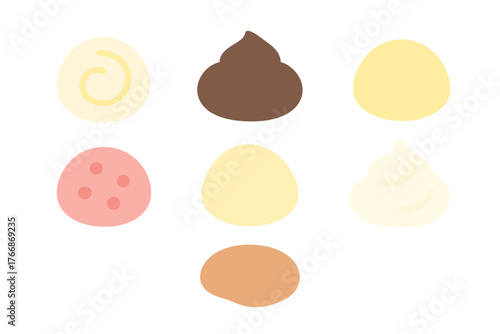 Sweet dessert toppings including chocolate dollops, whipped cream, and candy shapes