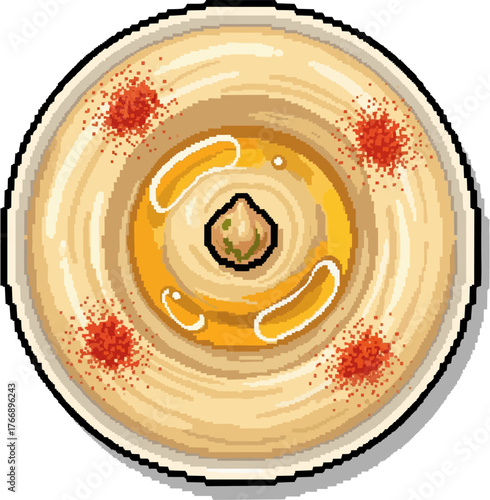 Overhead view of a delicious hummus dish, garnished with paprika and oil.