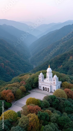 Wallpaper Mural Serene Golden Temple Complex Nestled Amidst Verdant Mountain Valleys Under Soft Morning Hues Torontodigital.ca