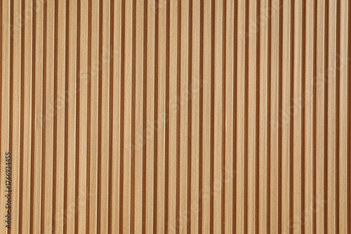 Beige colored wooden panel wall background