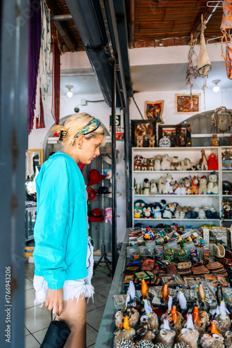 Young woman shopping at a local craft market