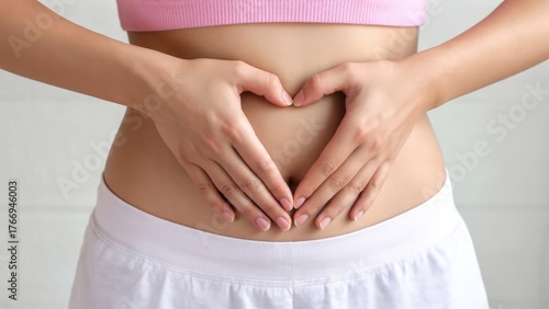 Wallpaper Mural Woman, heart and hands on stomach for fitness, weightloss diet or holistic gut wellness. Closeup female abdomen, love fingers or belly emoji of body digestion, skincare and healthy exercise in nature Torontodigital.ca