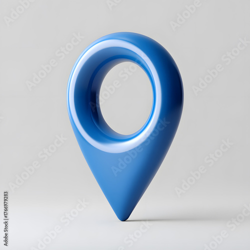 Free Download Blue glossy 3D location pin isolated on light background. Modern GPS navigation symbol for maps, travel apps, and digital interface design. - GFXLoad
