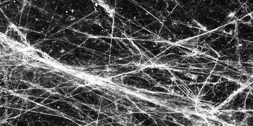 Abstract pattern of intricate white spiderwebs densely covering a dark background