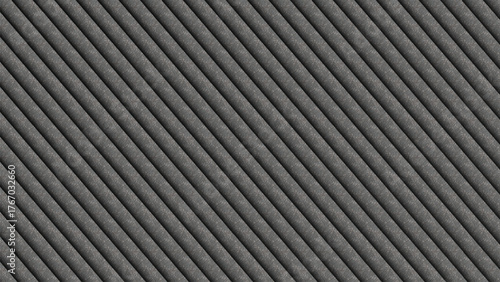 A close up view of a dark gray textured surface with parallel diagonal lines running across it