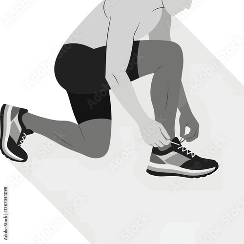 A man kneeling and tying his shoelace on his running shoes. He is about to start running or taking a rest