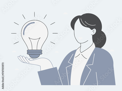 Businesswoman holding light bulb symbolizing innovation and creativity