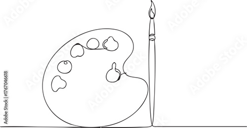 Artistic inspiration flows as a painter's palette and brush await creative expression in a minimalist, modern studio setting