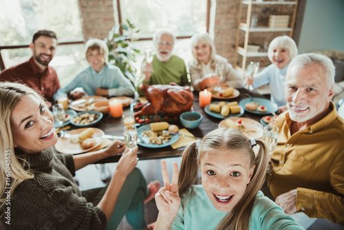 Photography Family feast today smiles abound as generations share turkey and laughter around