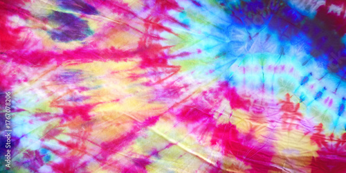 section of tie dye t-shirt fabric photo expanded with generative fill, swirl pattern in bright colors