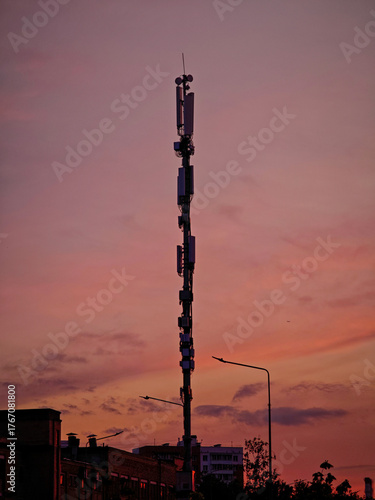 Cell phone mast against the sunset