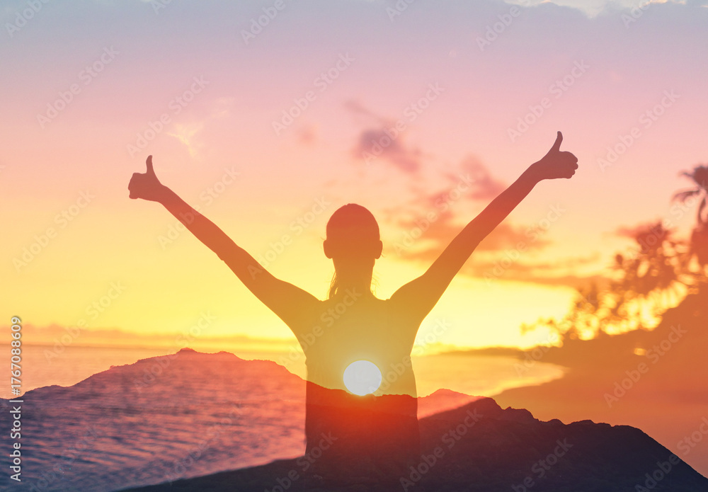 Fototapeta premium Young woman looking up at the morning sun light sky finding happiness, peace and hope in nature 