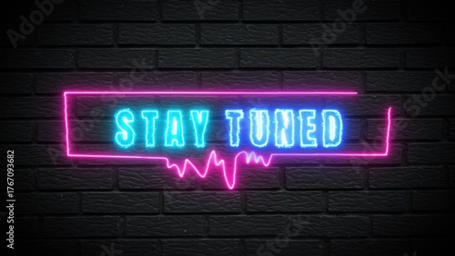 Tableau sur toile Exciting neon sign announces stay tuned for amazing news coming soon on dark bri