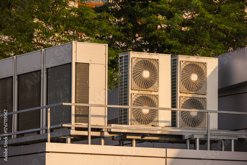 Obraz na płótnie Industrial air conditioning and ventilation units installed on a rooftop platfor