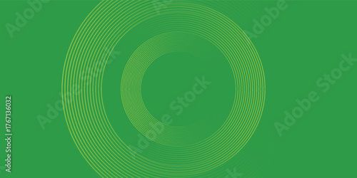 Abstract glowing green circle geometric line on dark green blue background.