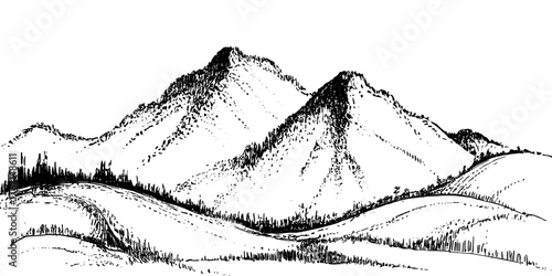 a mountain range with two tall peaks above a forested valley, perfect for nature and landscape themes.