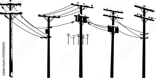 Snow-covered electric poles with power lines and transformers, winter utility network, electricity distribution infrastructure in cold rural landscape silhouette