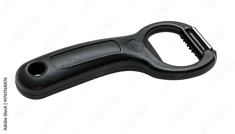 Fototapeta premium A black, ergonomic-handled kitchen peeler, isolated on black background, angled for clarity