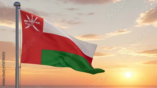 National flag of oman nation waving on the wind with a beautiful sunset on the background, banner of the country