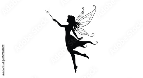 Elegant silhouette of a fairy with delicate wings holding a magic wand in a graceful pose