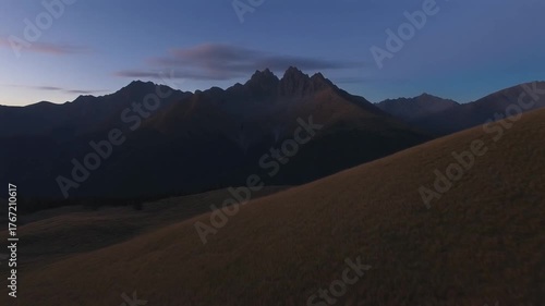 Flying over the beautiful mountain ranges at dusk