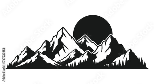 Dramatic silhouette of jagged mountain peaks against a large full moon or sun