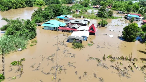 30,Sep,2025,Sena Ayutthaya, a storm and heavy rain caused water to overflow from the river and flood houses along the river called Mae Nam Noi in the rural area of Ayutthaya, Thailand.