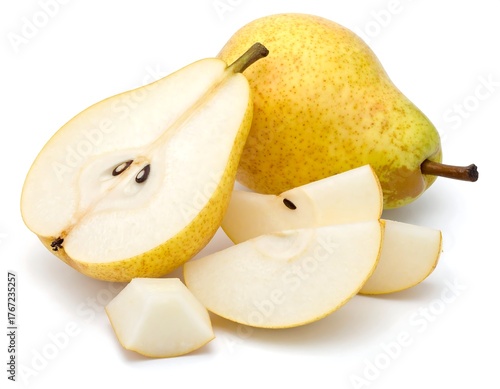 Close-up of ripe pears, whole, sliced, and a cube