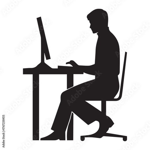Concentration and Productivity: A silhouette of an individual deeply engaged at a desk, typing on a computer, embodying focus and productivity in a modern work environment.