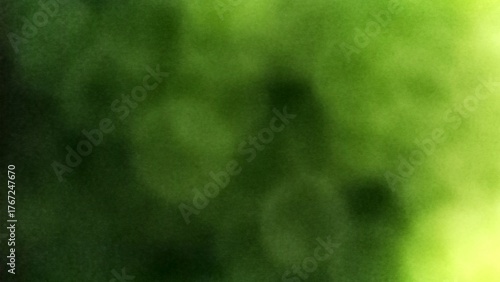 Close up of Abstract Green Bokeh Blur Background with Soft Light Effect