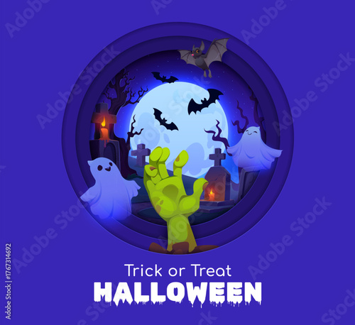 Halloween paper cut banner. Green zombie hand rising from grave, surrounded by glowing tombstones, ghosts and flying bats. A large full moon lights up the night Halloween sky in 3d vector round frame