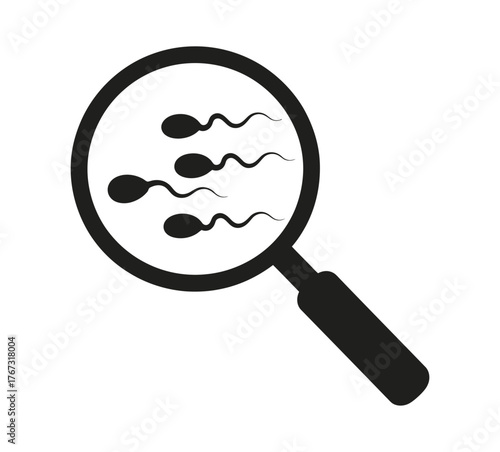 Magnifying glass revealing sperm cells for scientific research and fertility analysis