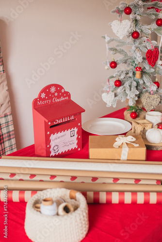 Living room interior. Christmas tree and wreath. New Year celebration. Vacation rentals. Winter holidays and vacations