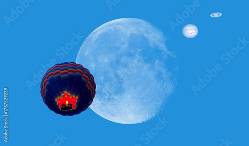Fototapeta Naklejka Na Ścianę i Meble -  Hot air balloon fly in the sky - Jupiter-Saturn Convergence That Happens Every 20 Years, full moon in the foreground 