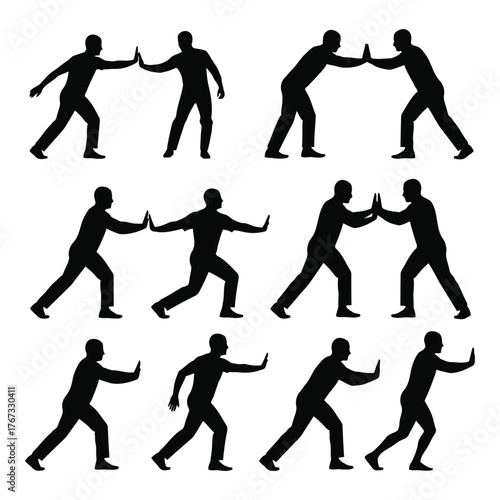 Silhouettes of people pushing against something wall barrier or obstacle